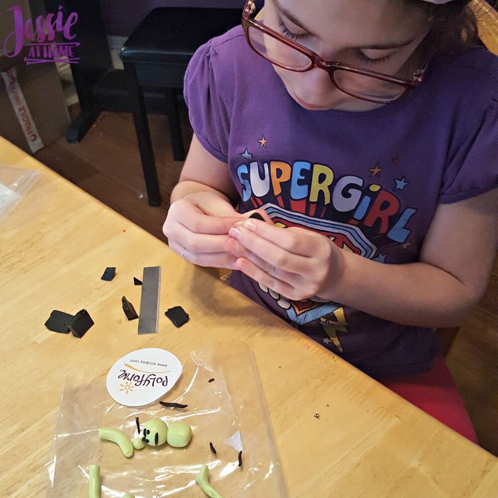 Kyla making a Sculpey Hulk