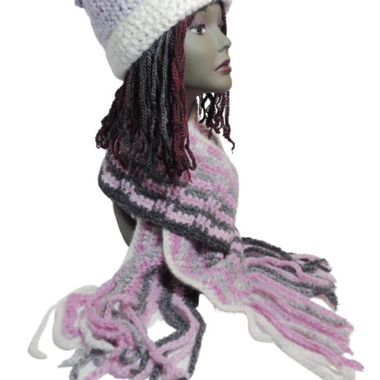 Image of a pink and gray fluffy scarf and a purple and white stocking hat with a folded up brim on a mannequin head.